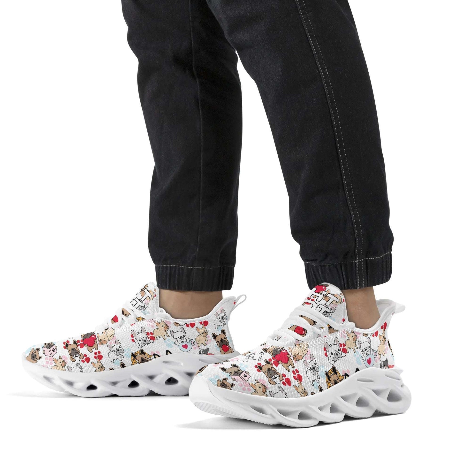 Beast Air Mesh Sneakers - Frenchie: White athletic shoes with colorful French bulldog print pattern, featuring chunky soles and lace-up design. Worn with black pants, showcasing the shoe's unique style and comfort for running and workouts.