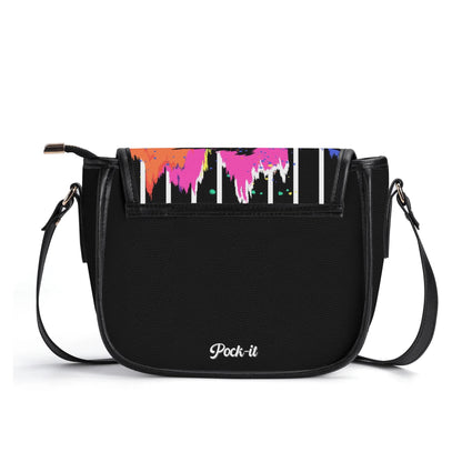 "Urban Graffiti saddle handbag with vibrant graffiti art, sleek design, and ample storage space."