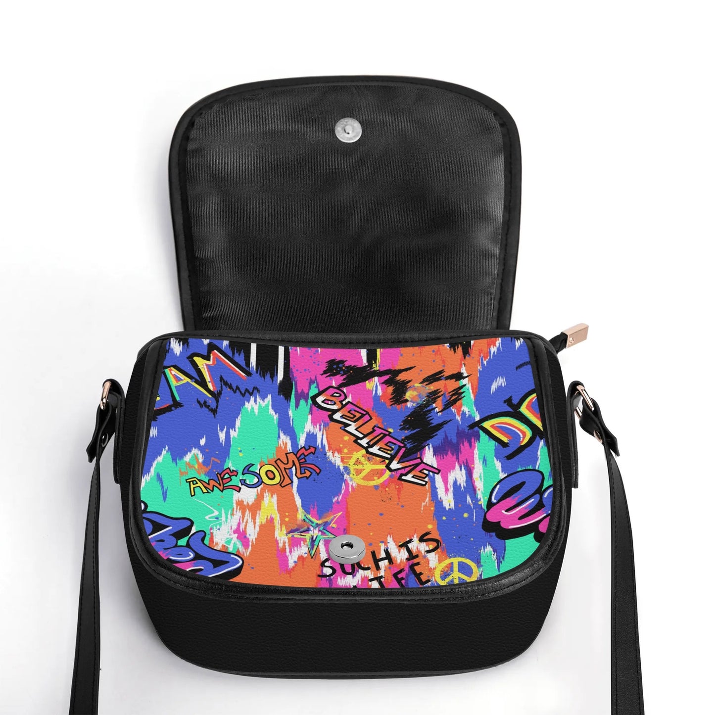 "Urban Graffiti saddle handbag with vibrant graffiti art, sleek design, and ample storage space."