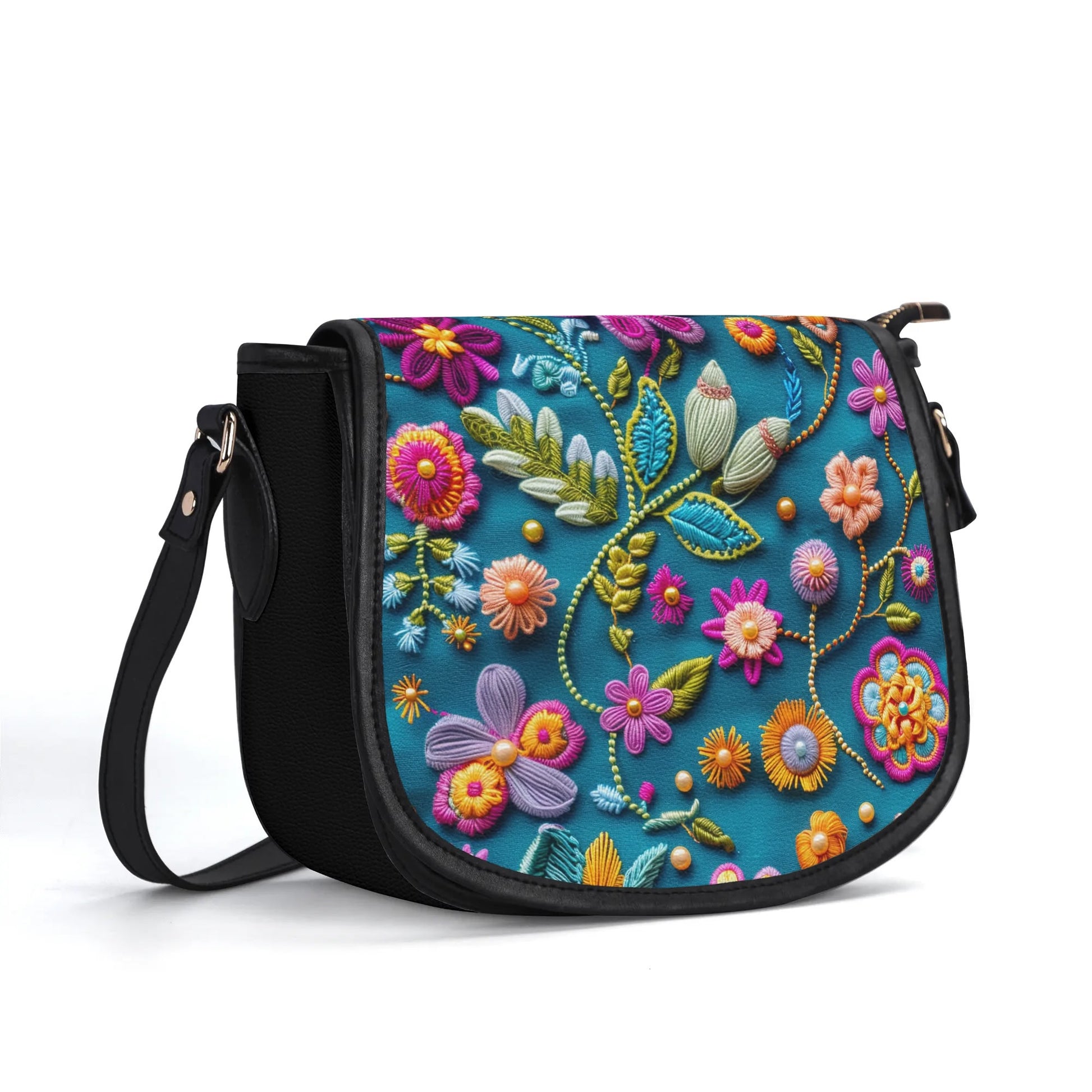 "Pock-It Saddle Handbag - Petal Pop by ShitHot features colorful flower print, secure zipper, and adjustable strap."