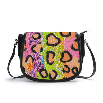 "Wild Sparkle handbag with vibrant colors and sequins, featuring secure closure and spacious interior."