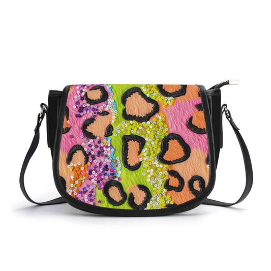 "Wild Sparkle handbag with vibrant colors and sequins, featuring secure closure and spacious interior."