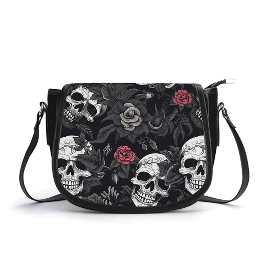 "Skull Garden saddle handbag with colorful flowers and skulls, secure closure, and ample storage space."