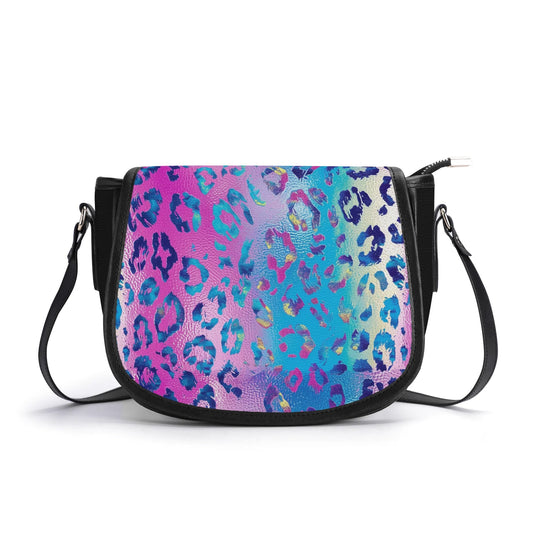 "Funky Leopard saddle handbag with vibrant abstract design, secure closure, and adjustable strap."