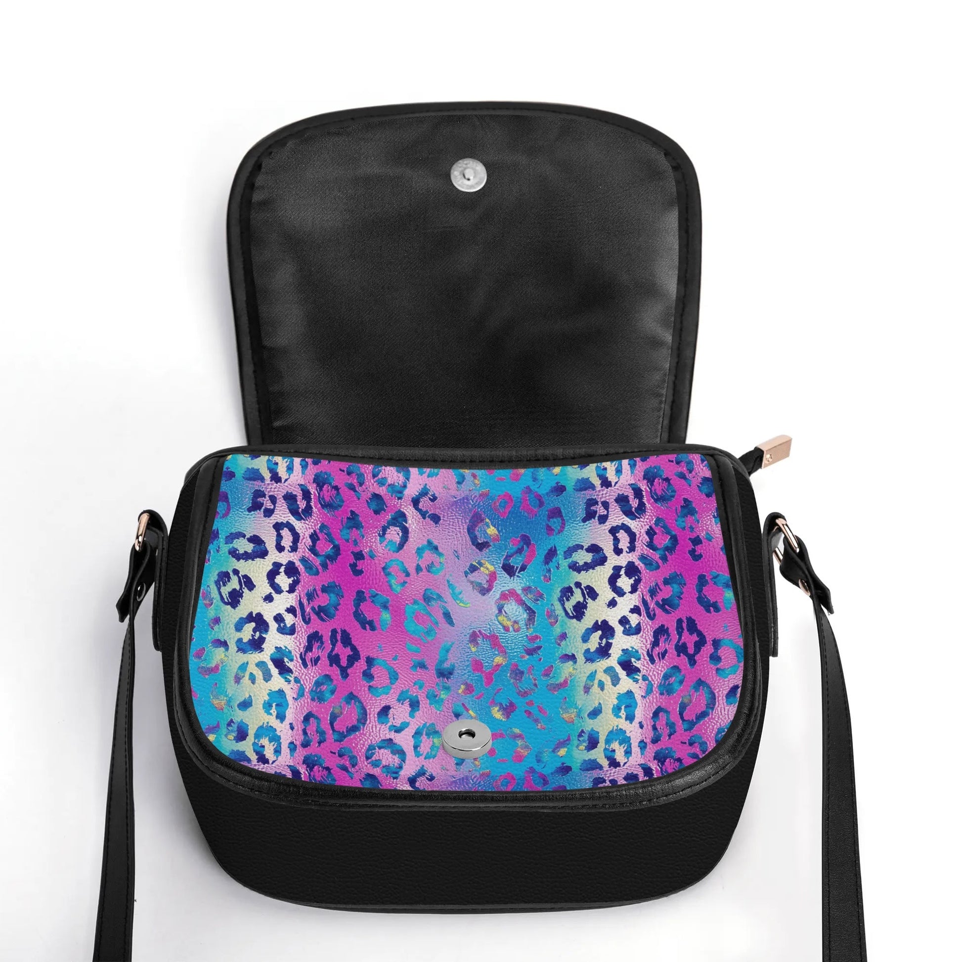 "Funky Leopard saddle handbag with vibrant abstract design, secure closure, and adjustable strap."