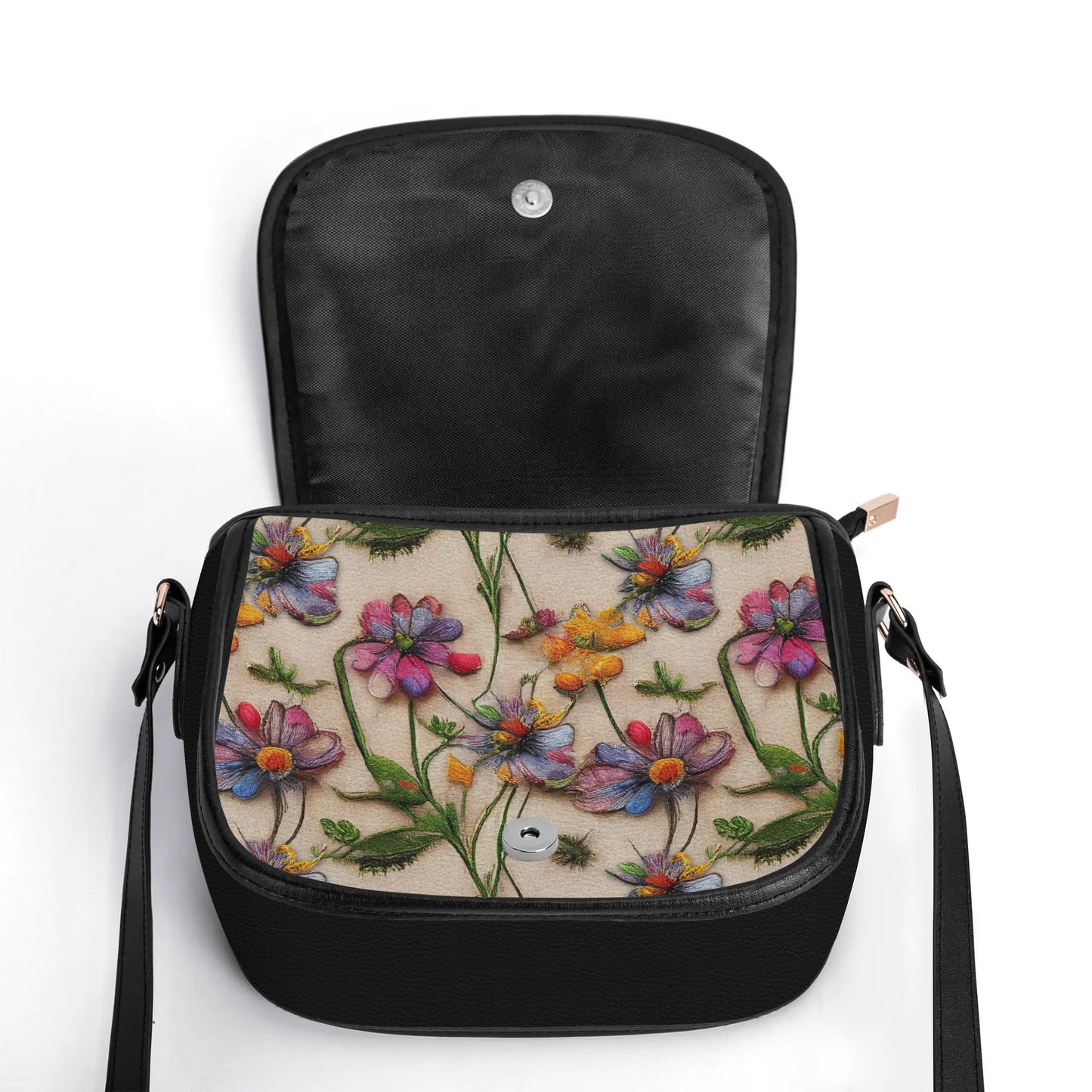 "Wildflower saddle handbag featuring a stunning 3D illusion of flowers, secure closure, and ample space."