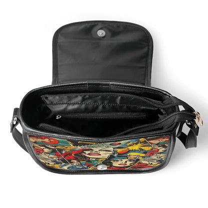 "Comic Strip saddle handbag with pop art panels, sleek design, and spacious black interior."