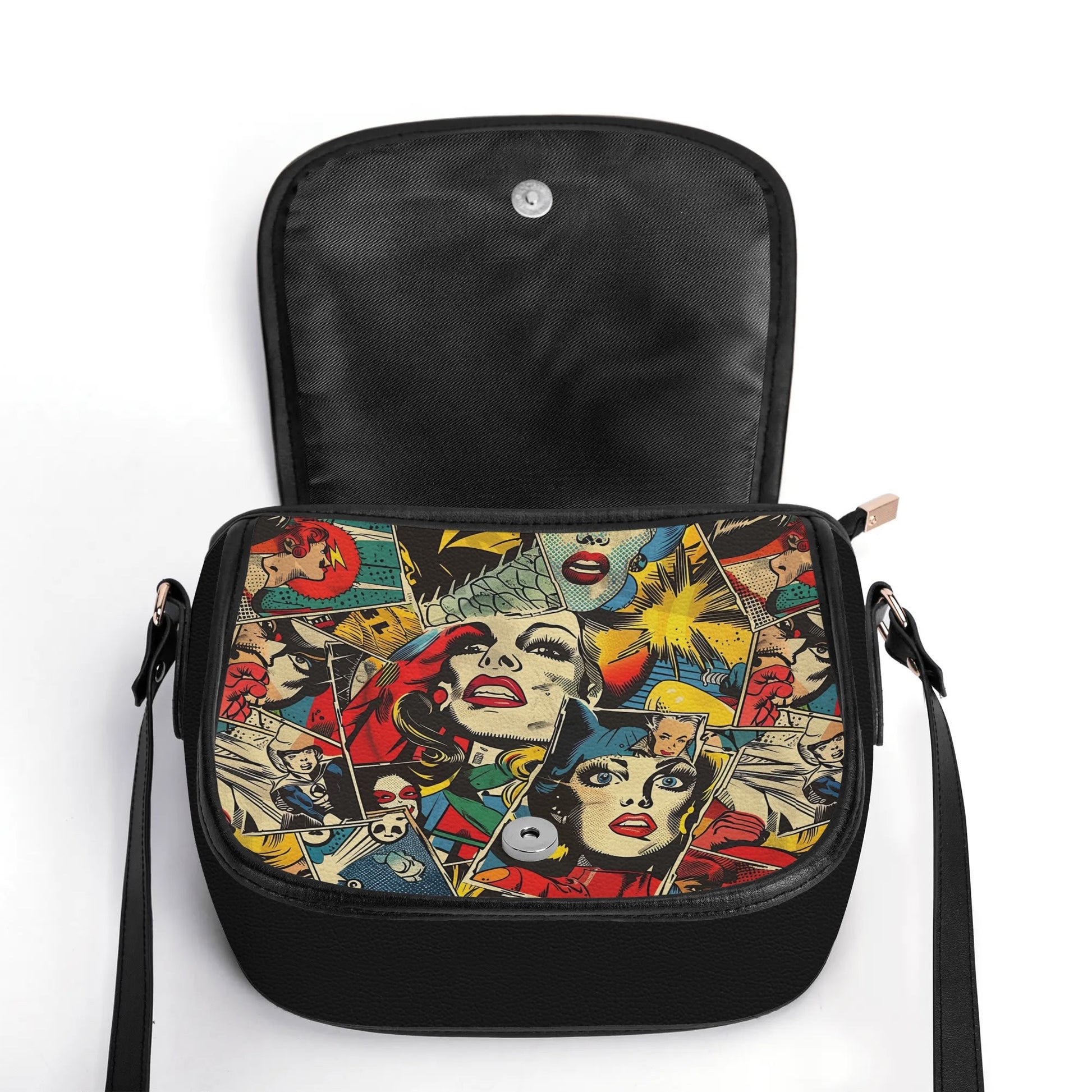 "Comic Strip saddle handbag with pop art panels, sleek design, and spacious black interior."