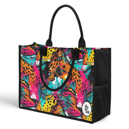 "Abstract neon leopard print tote bag by ShitHot, featuring captivating eyes peeking through vibrant spots for a wild look."