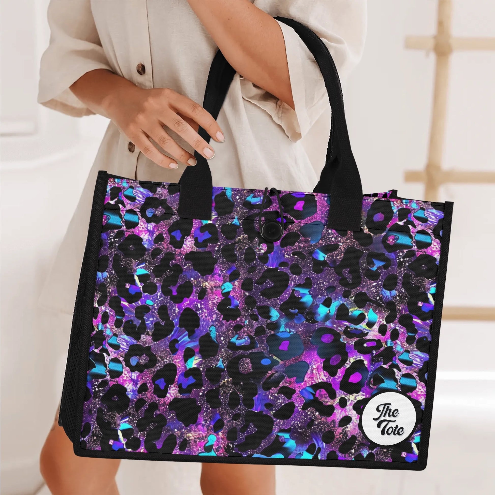 "Futuristic neon blue and purple leopard print tote bag by ShitHot, ideal for modern fashion enthusiasts and trendsetters."