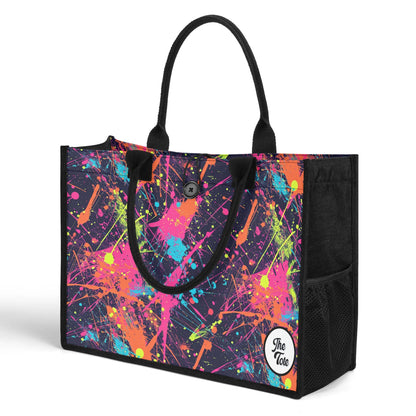 "Artistic tote bag with a vibrant paint splat design by ShitHot, ideal for creative spirits and expressing unique styles."