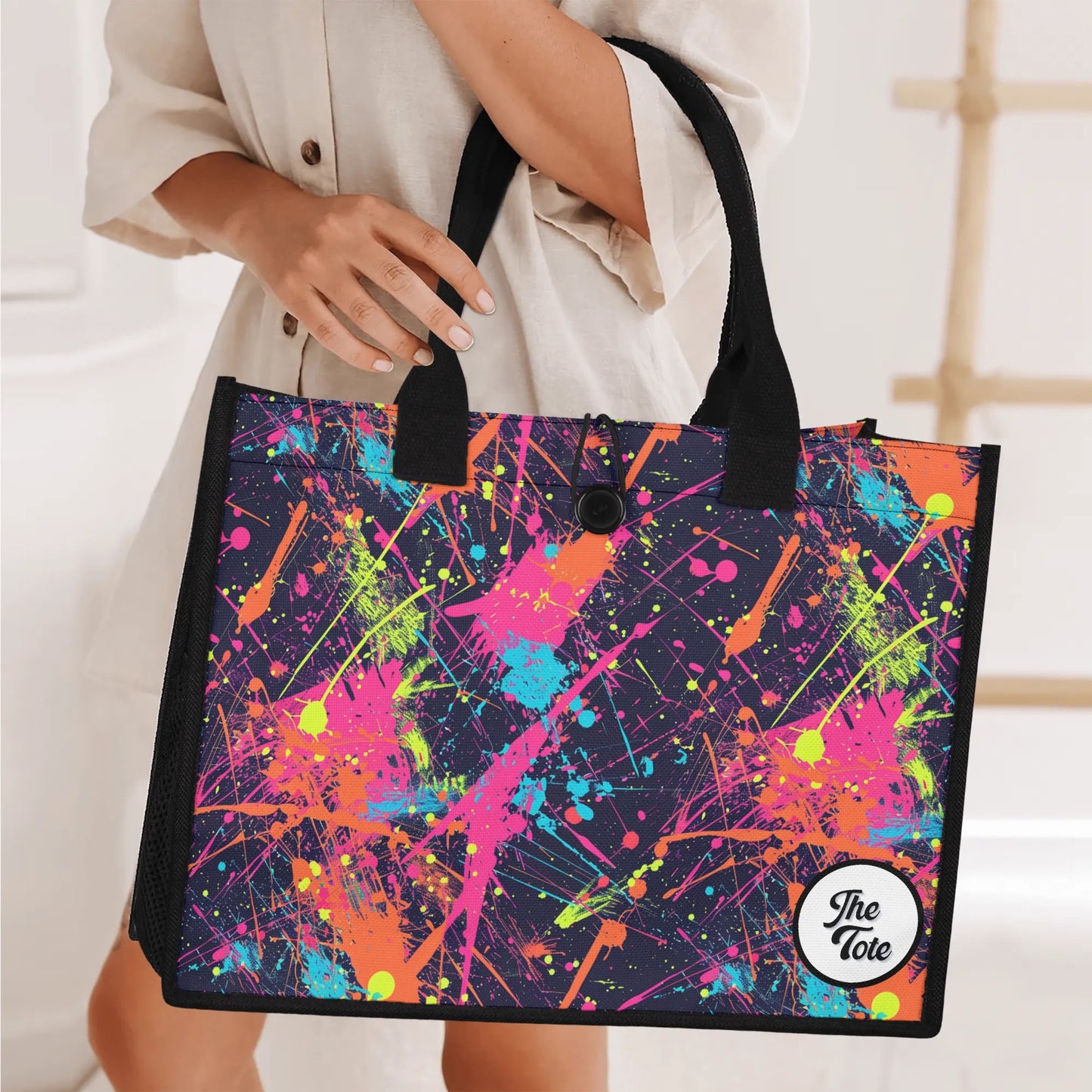 "Artistic tote bag with a vibrant paint splat design by ShitHot, ideal for creative spirits and expressing unique styles."