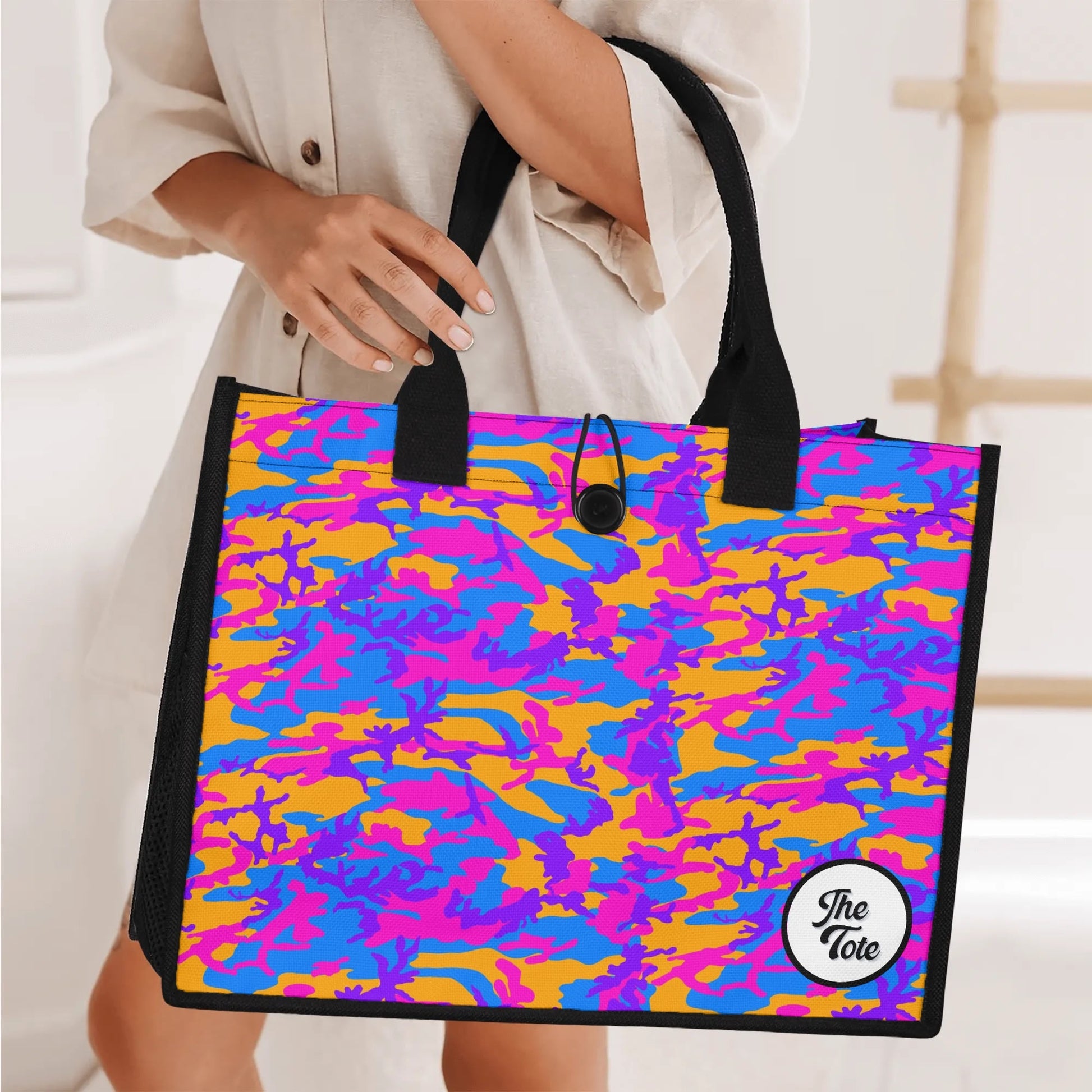 "Dynamic storm camo design tote bag in deep purples and electric blues, ideal for those with adventurous styles."