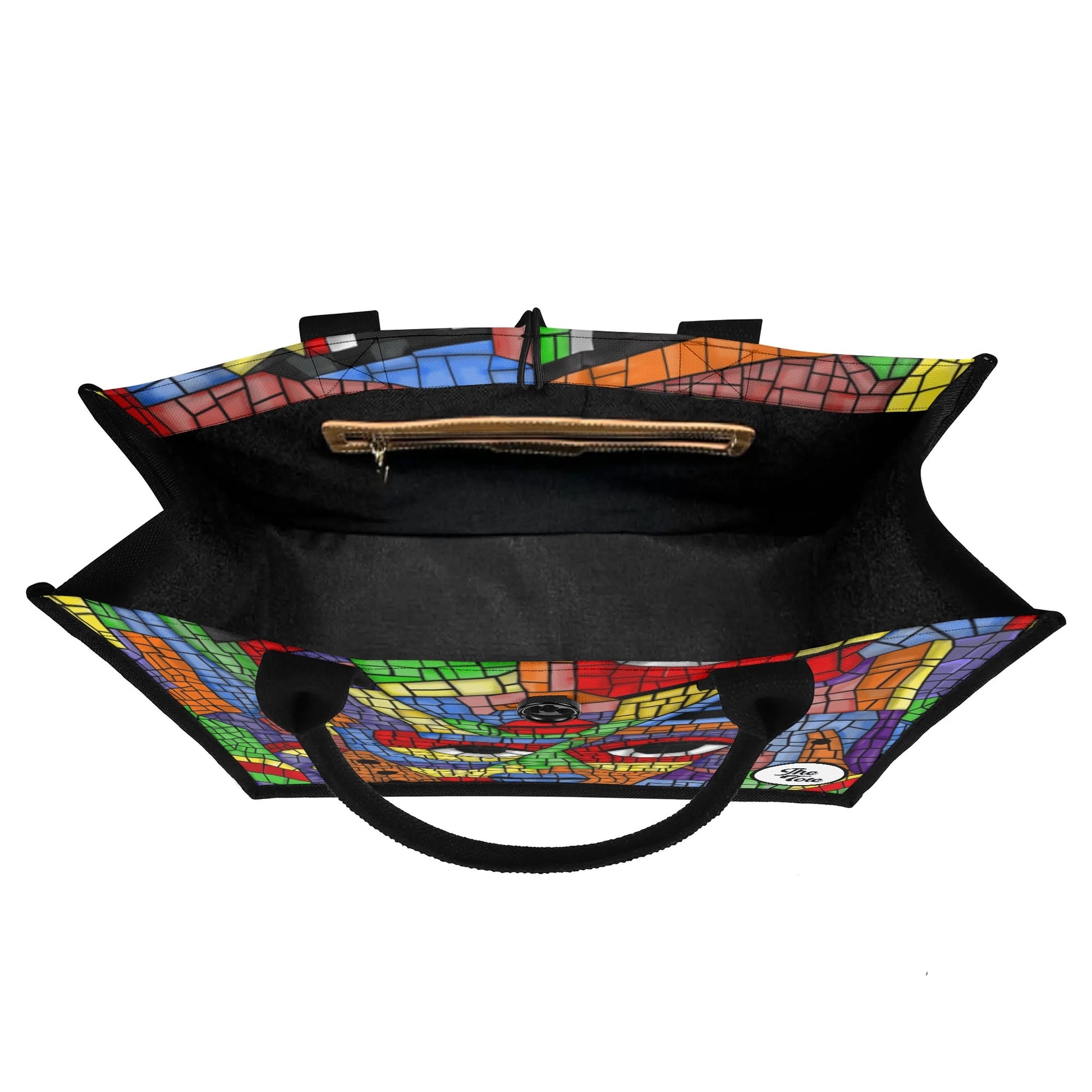 "Artistic mosaic tile pattern tote bag showcasing an abstract face design, ideal for art lovers and creative spirits."