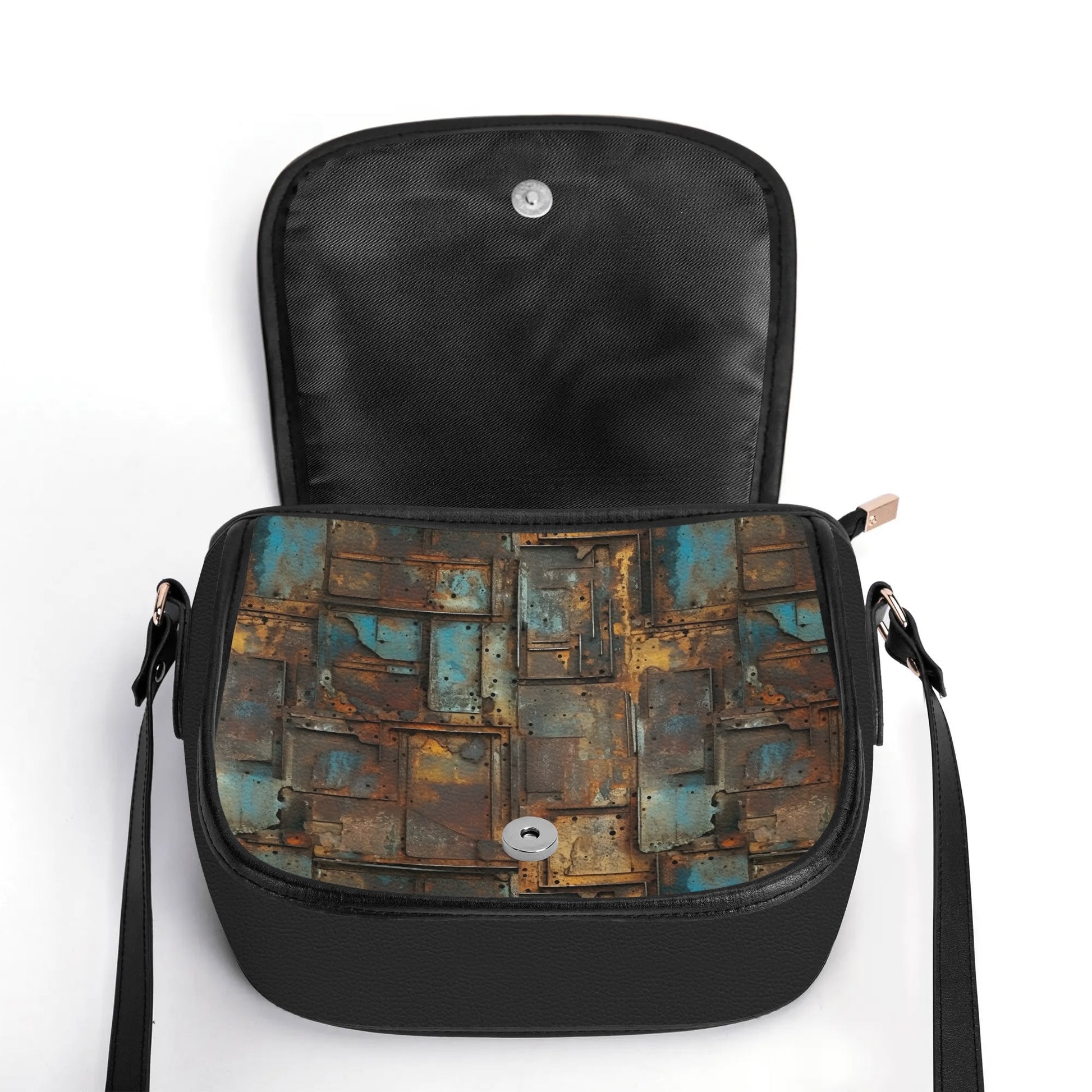 "Full Metal handbag featuring oxidized metal-inspired patterns, sleek design, and ample storage space."