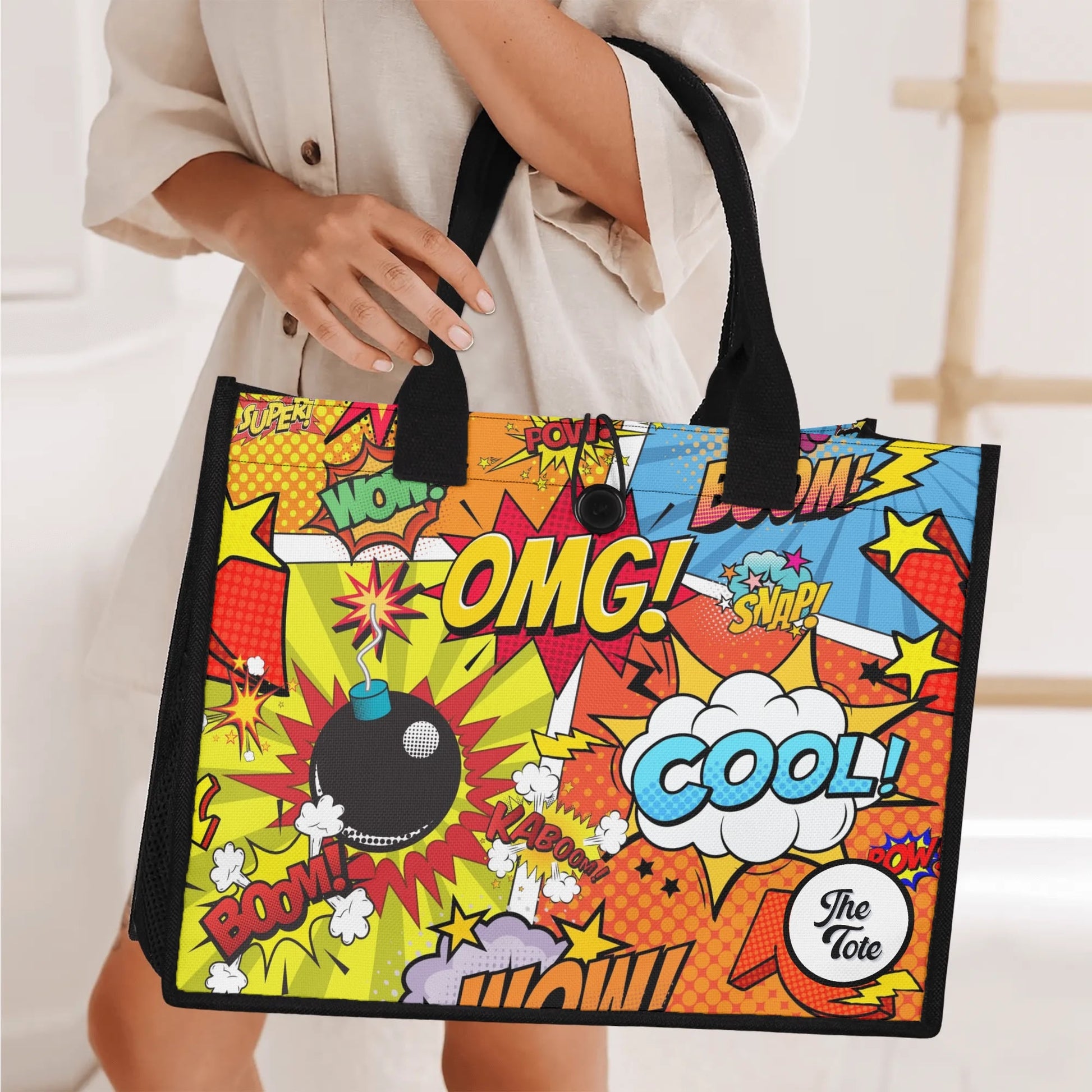 "Vibrant comic-inspired tote bag by ShitHot, featuring bold colors and dynamic illustrations for a playful pop-art vibe."