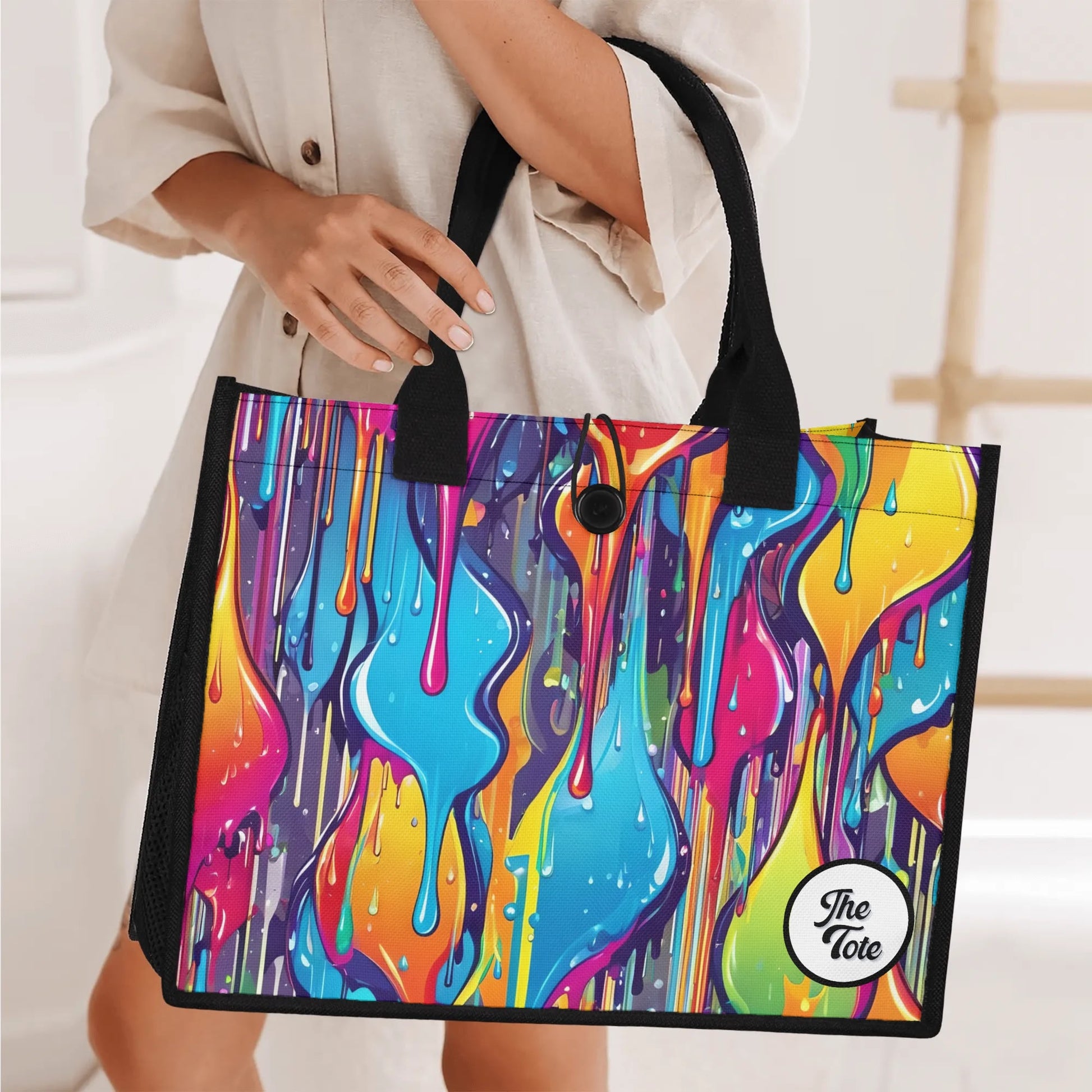 "Surreal design tote bag by ShitHot, showcasing vibrant, dripping colors that evoke the essence of melting paint art."
