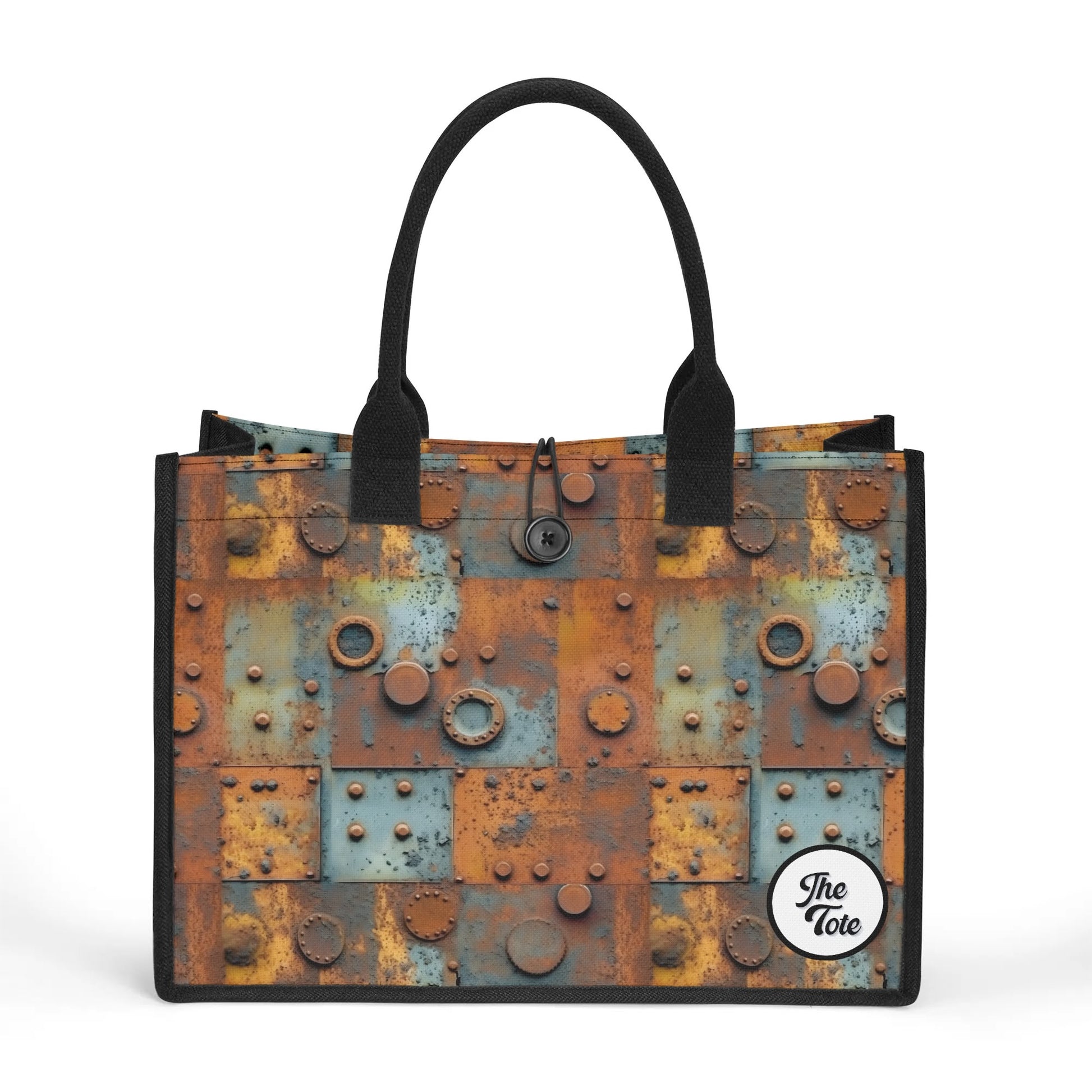 "The Tote Bag - Metal Head features oxidized panels and metal accents, available in two sizes for stylish functionality."