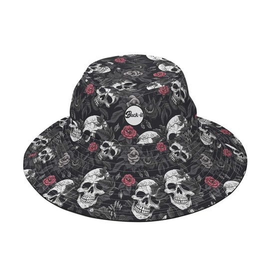 Skull Rebel Bucket Hat featuring a black background with white skull pattern and red rose details, wide brim design with circular brand logo patch. Women's Collection, Women's Hat Collection, ShitHot Best Sellers.