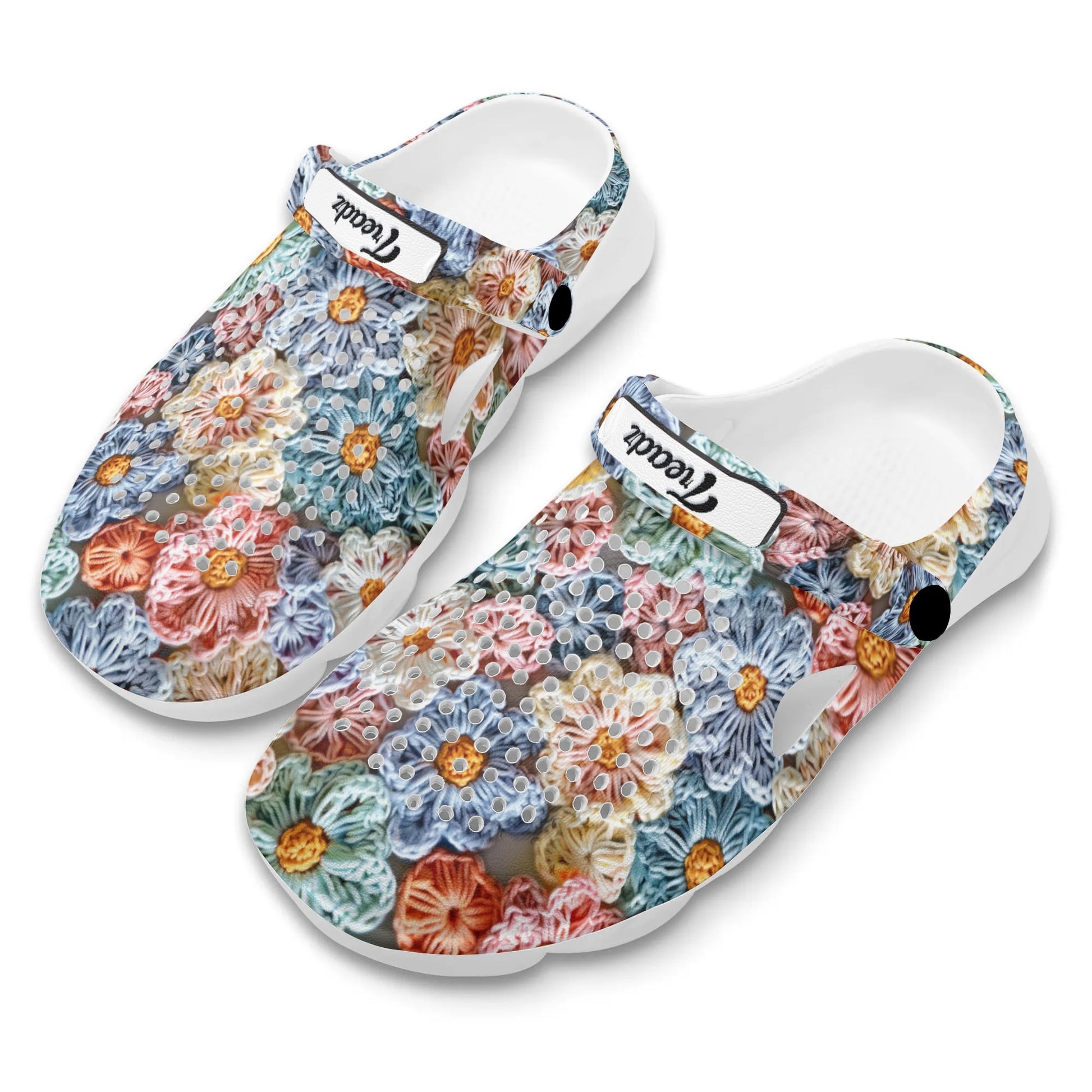  "Colorful flower print clogs by ShitHot, designed for comfort with breathable EVA material, perfect for long wear."
