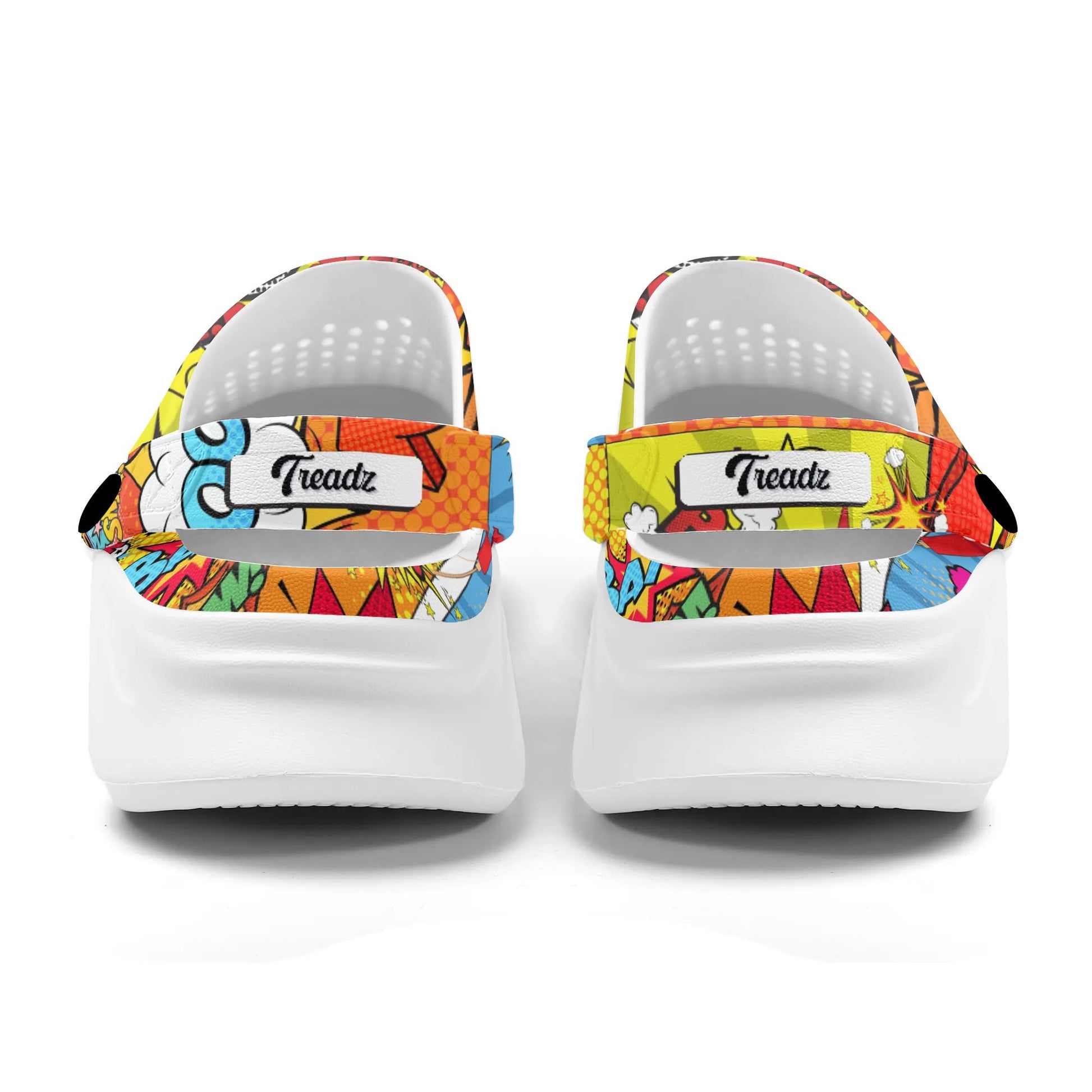 Treadz Clogs - The Comic by ShitHot. Vibrant comic-style print clogs by theshithotcompanyt, perfect for adding a playful pop to your daily look."