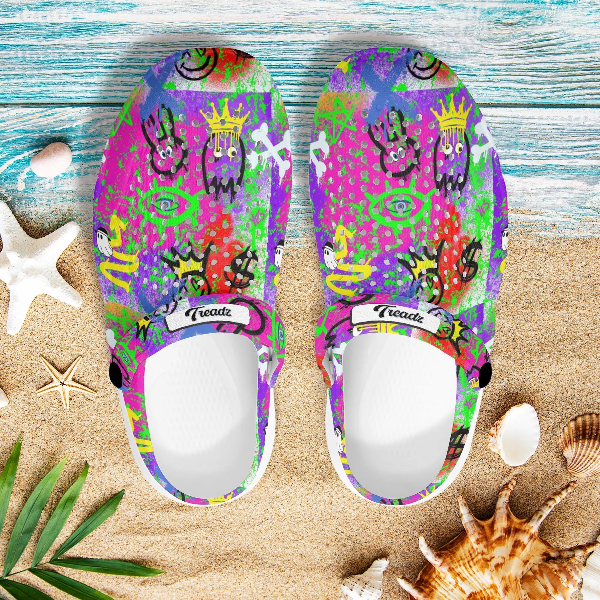 The Notorious by ShitHot. Graffiti pattern clogs by theshithotcompany, bursting with playful designs for vibrant, all-day comfort.