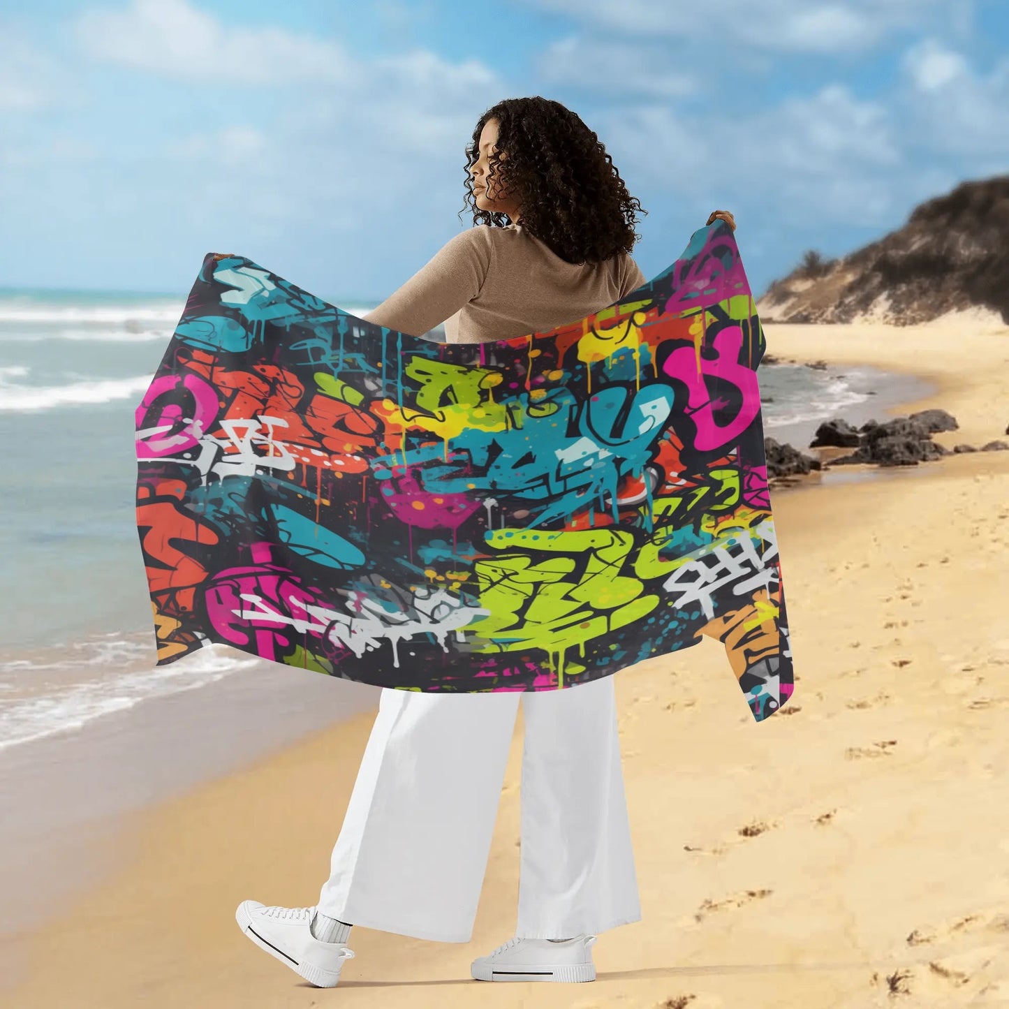 Dynamic Rip Tide Street Art Sarong by ShitHot, showcasing vivid graffiti designs—ideal for beach days and summer fun! theshithotcompany