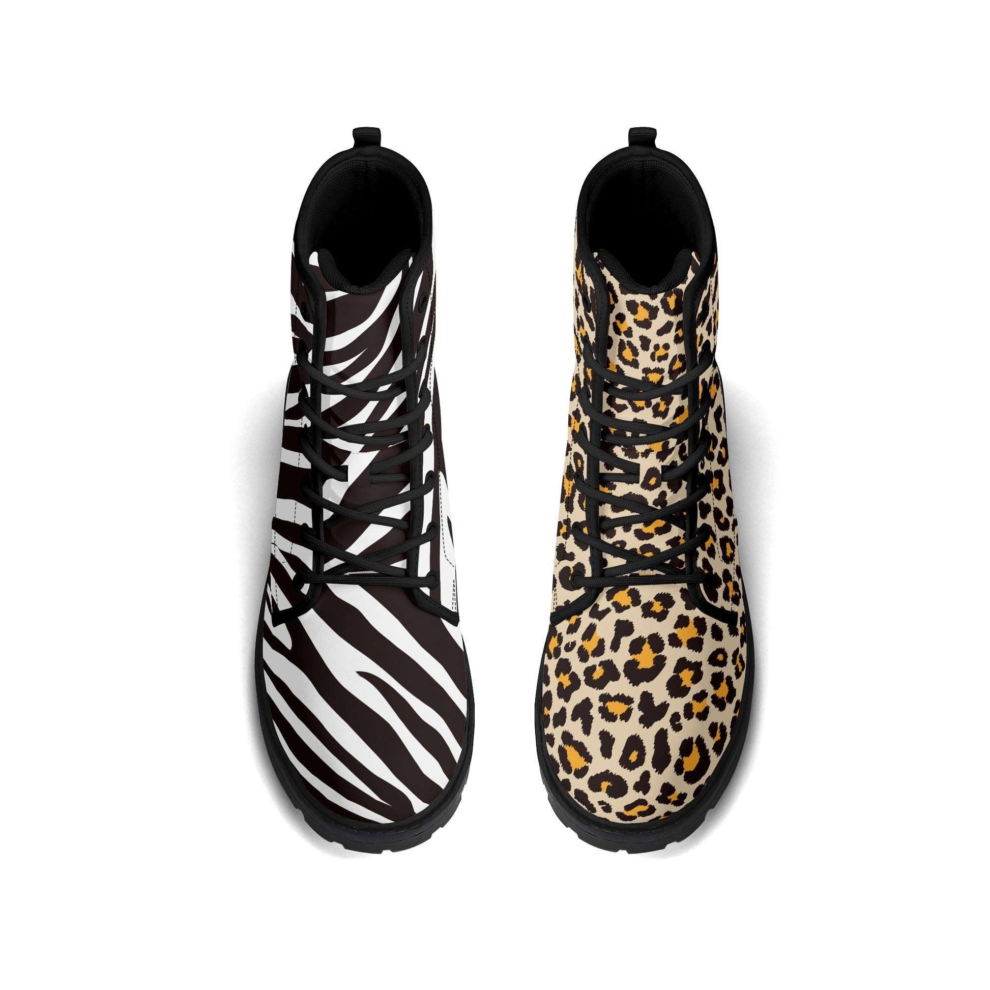 Treadz Men's Mismatch Signature Boots - Safari featuring unique zebra print on one boot and leopard print on the other, with black laces, platform sole, and rubber outsole. Stylish mismatched animal print design perfect for fashion-forward men.