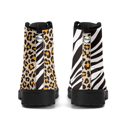 Treadz Men's Mismatch Signature Boots - Safari featuring unique mismatched animal prints with leopard pattern on one boot and zebra stripes on the other, black rubber sole, and lace-up design with platform heel