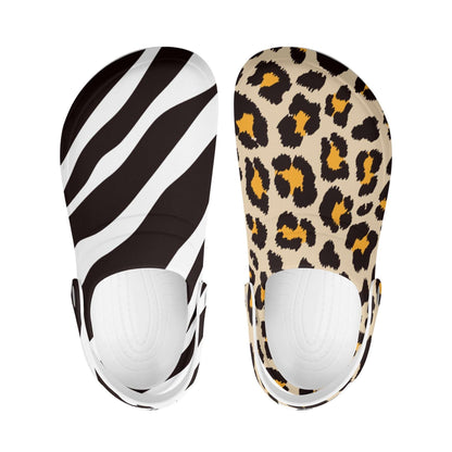 Treadz Nursing Slide On Mismatch Clogs - Safari featuring mismatched zebra striped and leopard print patterns on comfortable nursing clogs. One clog displays black and white zebra stripes, while the other shows tan and brown leopard spots.