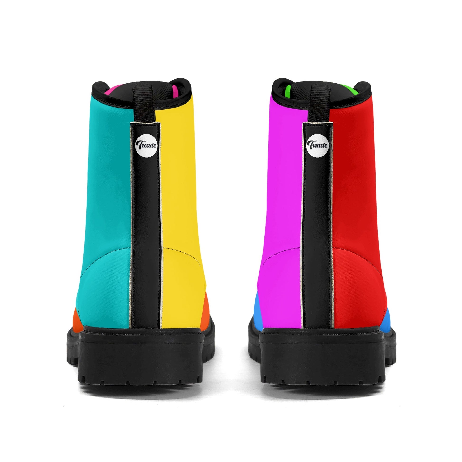 Treadz Men's Mismatch Signature Boots - Flare featuring vibrant color-blocked design with turquoise, yellow, pink, and red panels divided by black vertical stripes, set on black rubber soles. Rear view shows mismatched colorways on each boot with brand logo emblem.