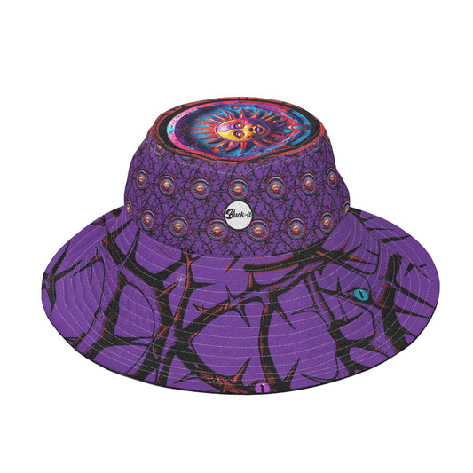 Stylish purple bucket hat featuring vibrant sun mandala design on top, black geometric patterns on brim, and decorative circular metal grommets around crown. Reversible wide-brim sun protection hat perfect for outdoor activities.