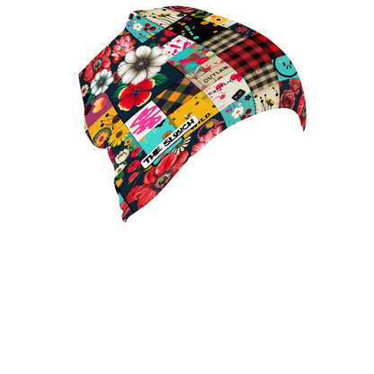 Skull Cap Beanie - Patched Punk features a vibrant patchwork design with floral prints, buffalo plaid, and artistic patterns in red, turquoise, yellow, and white. This trendy polyester beanie combines punk and vintage aesthetics for a unique street-style look.