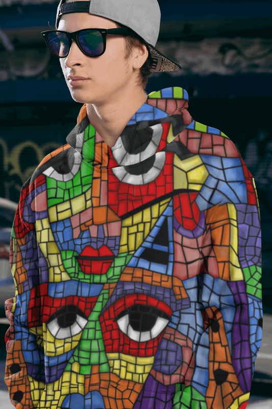 Rogue & Co Men's Hoodie - The Picasso: Vibrant mosaic-style design with abstract face pattern, colorful geometric shapes, worn by person in sunglasses and backwards cap, showcasing unique and eye-catching style